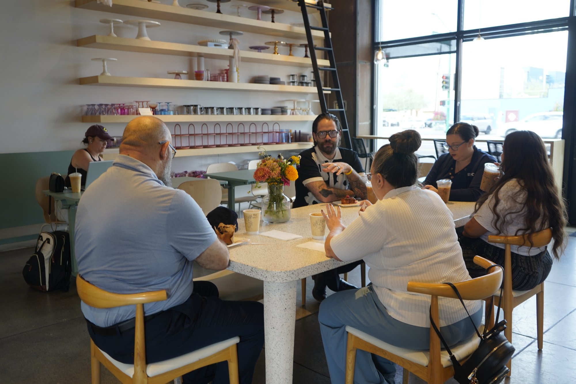 Group Sitting Around Table