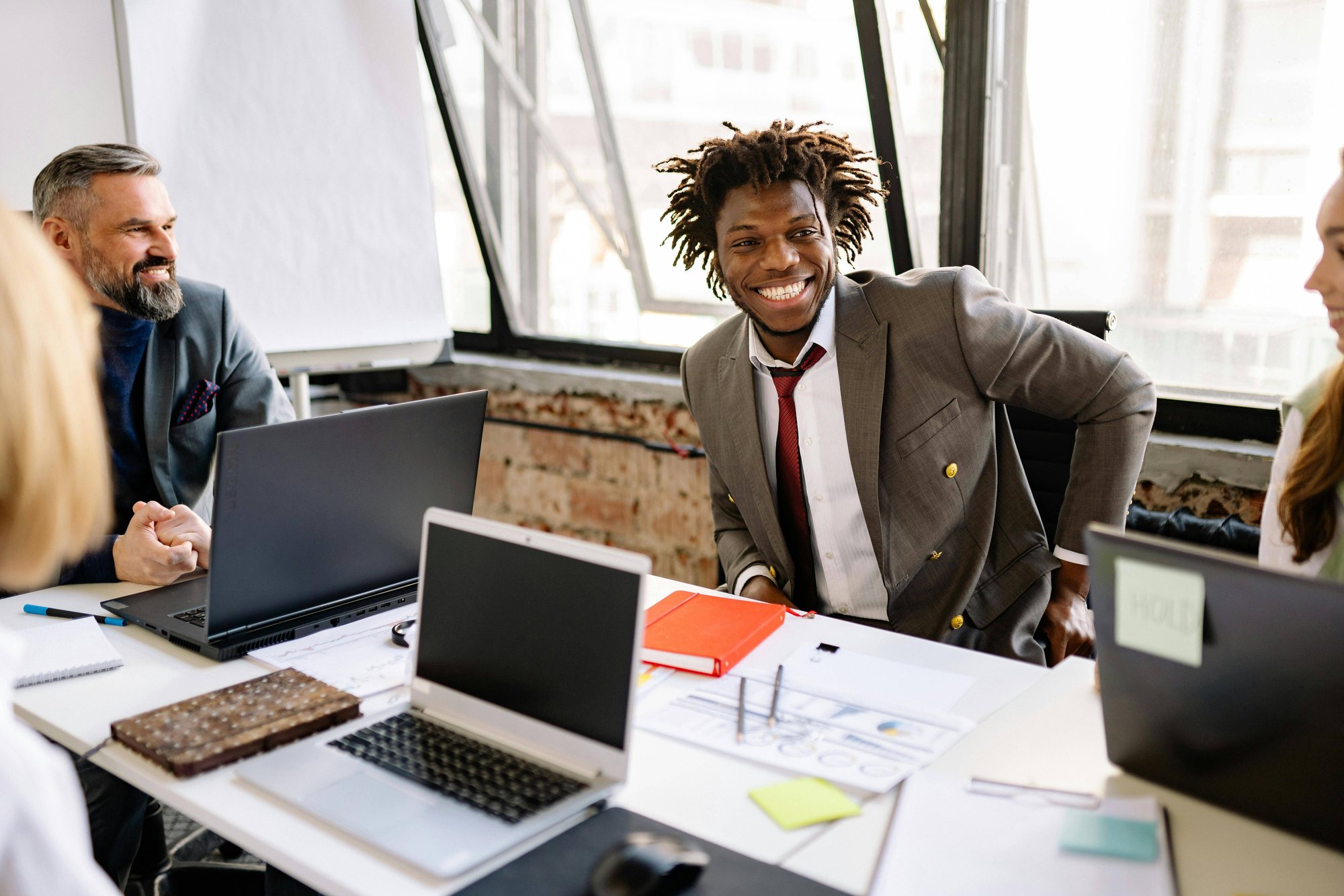 African American Male in Suit in Meeting